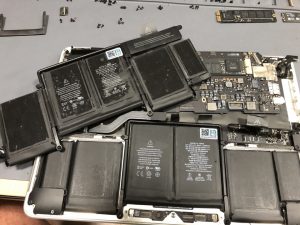 Genuine battery replacement done on a MacBook Pro 13" A1502