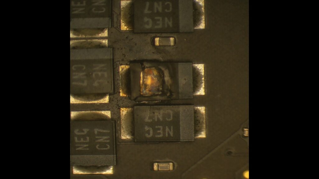 MacBook Air 13" M2 logic board repair with a blown capacitor